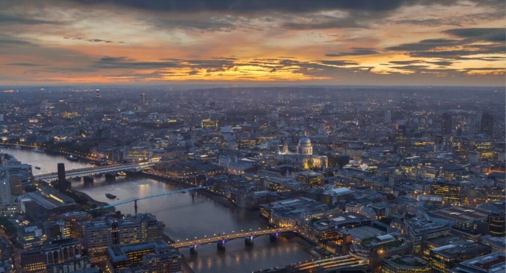 An aerial shot of London with emphasis on the horizon.