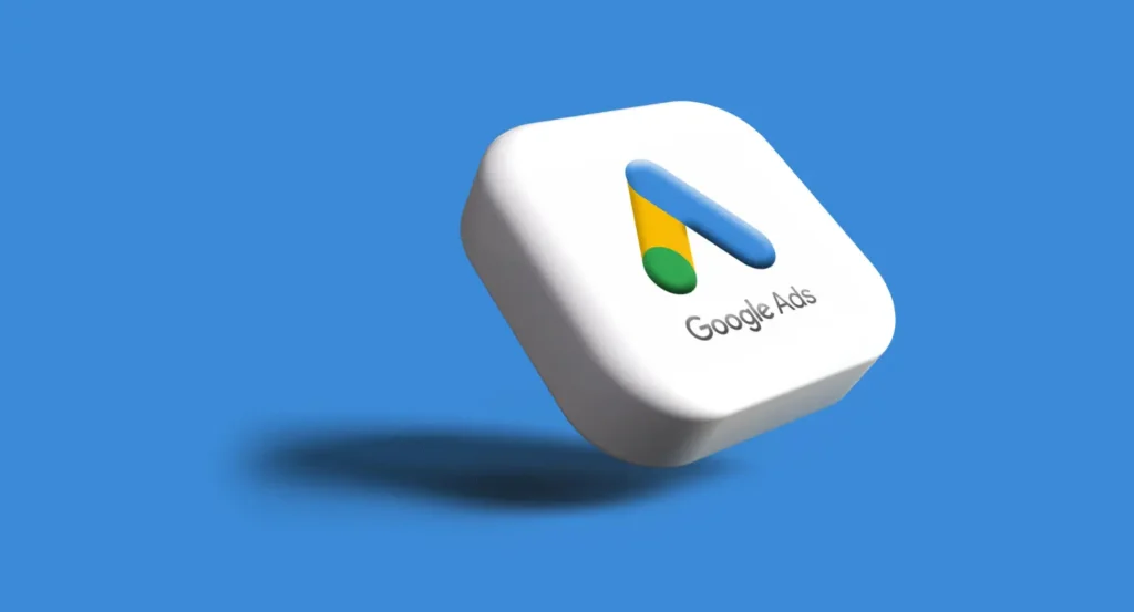 A 3D version of the google ads logo on a blue background.